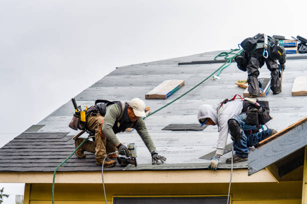 Professional Gutter Installation technician working in Bondurant, IA